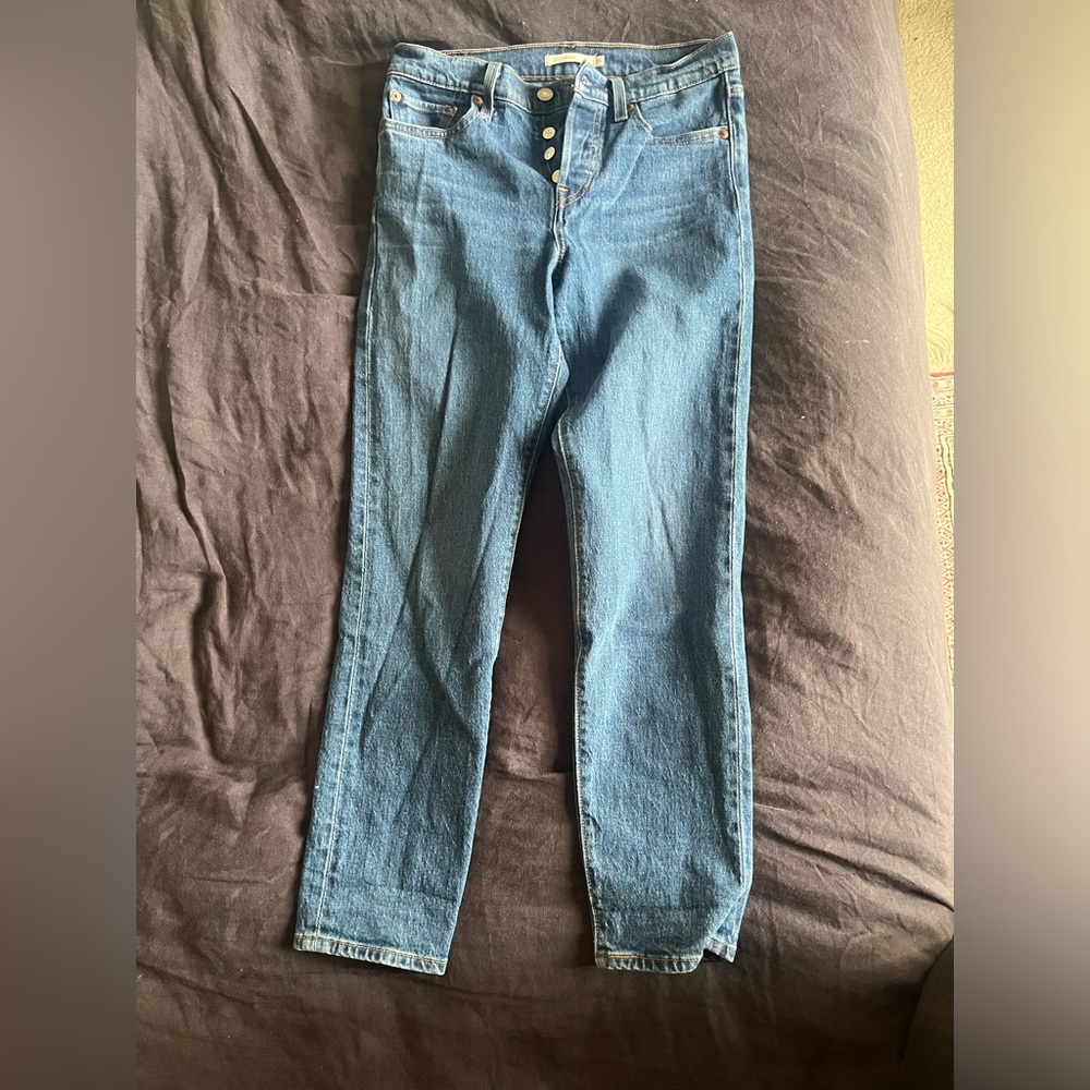 Levi’s button fly “WEDGIE” straight leg mid- rise jeans in classic color